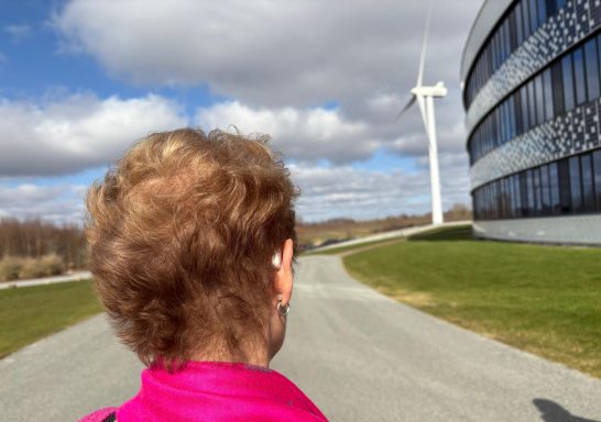All About Hearing Co-Director and Lead Audiologist, Karen Finch, outside the Widex HQ in Copenhagen wearing and testing the new Widex Allure