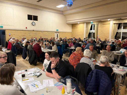 An overview image showing a number of the attendees taking part in the quiz inside Kesgrave Community Centre