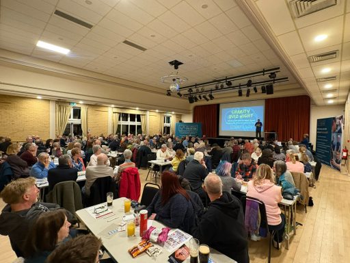 An overview image showing a number of the attendees taking part in the quiz inside Kesgrave Community Centre